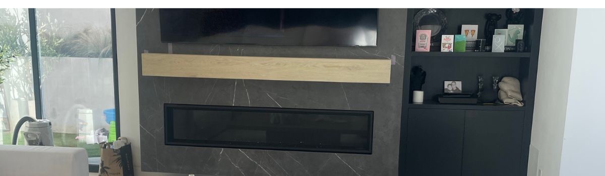 Reclaimed wood fireplace mantel beam installation