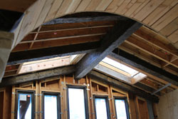 Reclaimed beams in ceiling