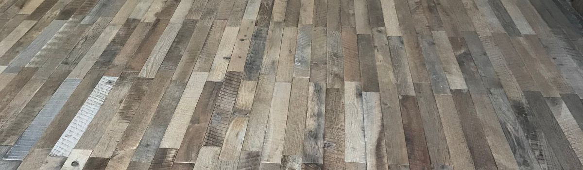 Weathered grey reclaimed barn siding interior wall cladding